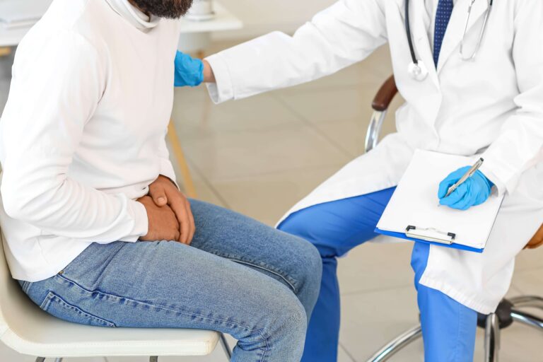 Man with prostate problem visiting urologist in clinic, closeup